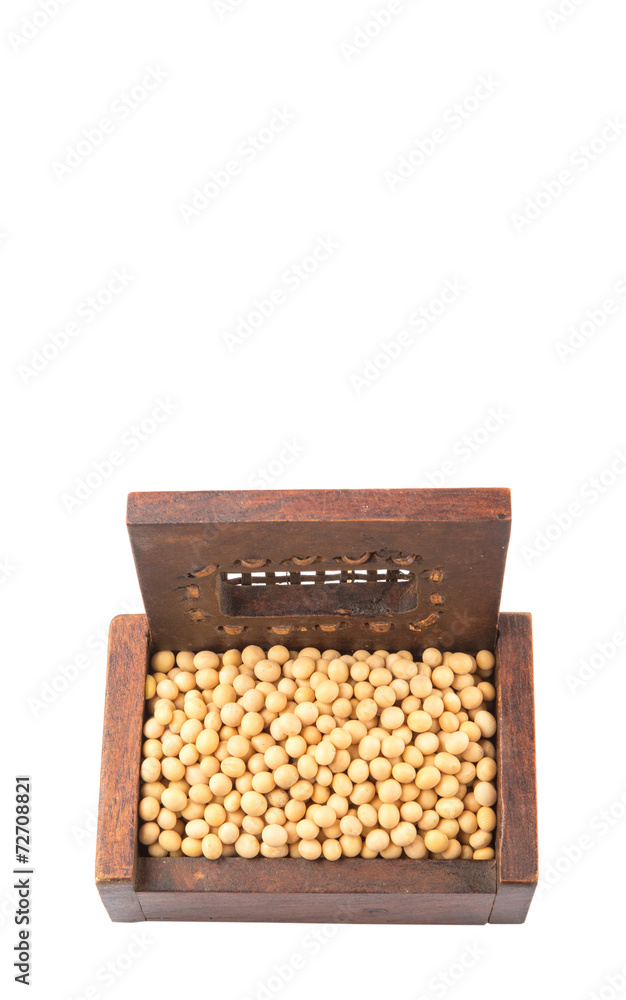 Soybean in wooden box over white background Soybean in wooden box over white background