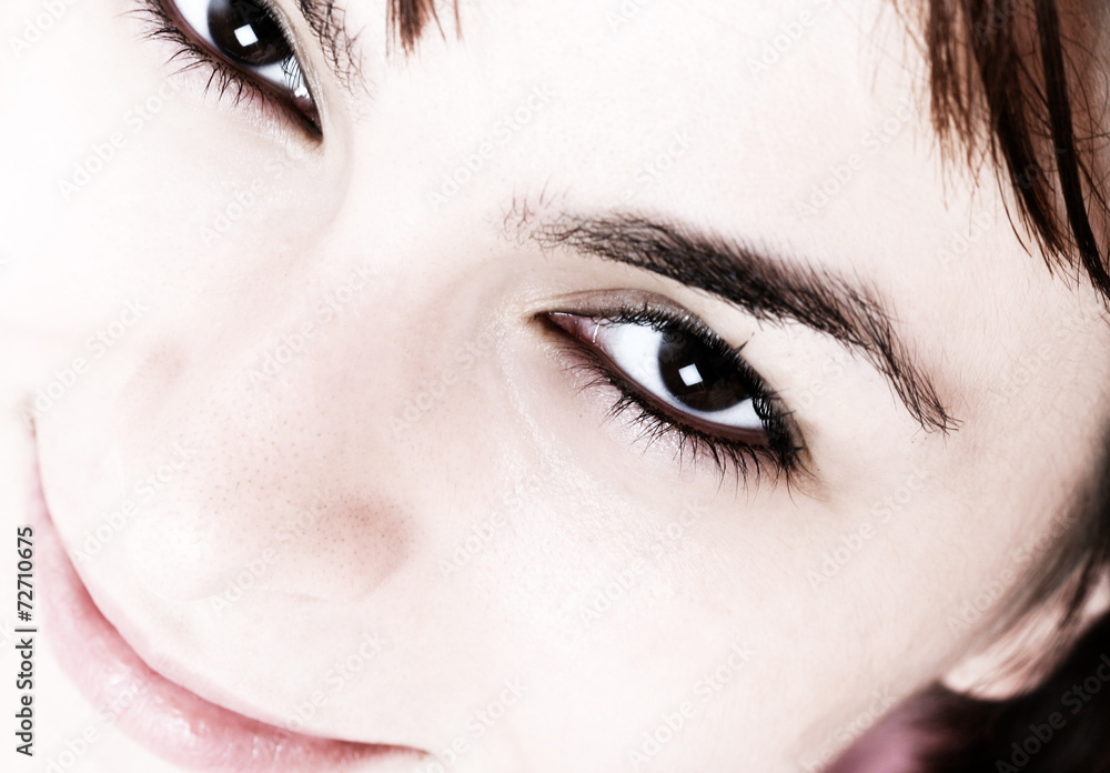Naklejka premium Beautiful young woman face.