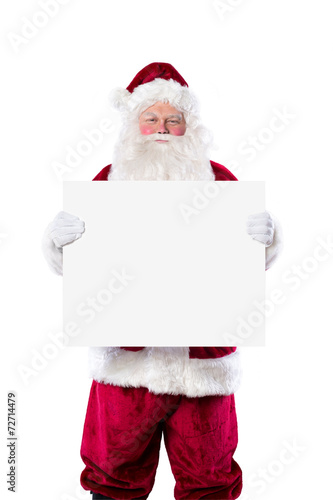 Santa Claus holding blank sign © Lee Rich