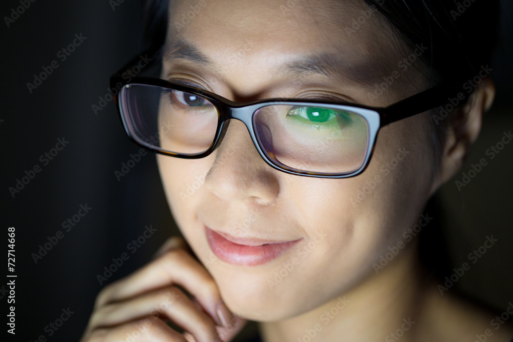 Woman use electronic device at night Woman use electronic device at night