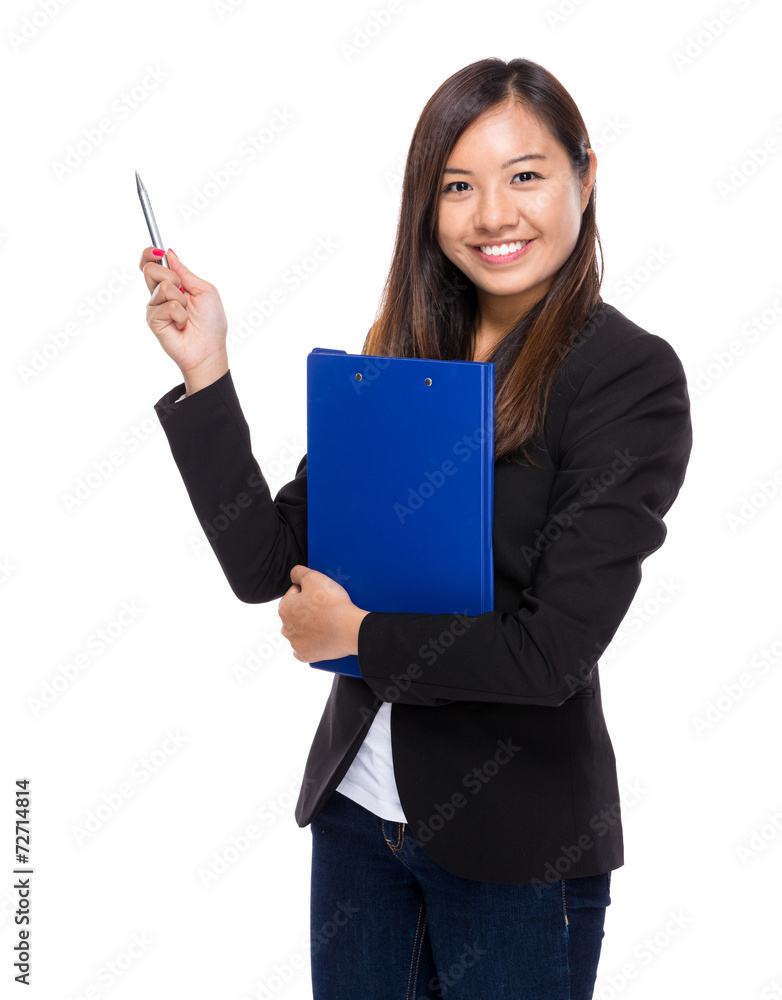 Businesswoman with clipboard and pen point up Businesswoman with clipboard and pen point up
