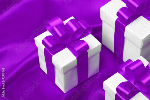 gift on purple satin background