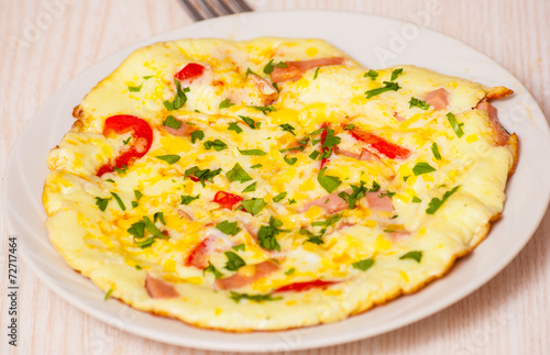 omelette with ham, vegetables and cheese