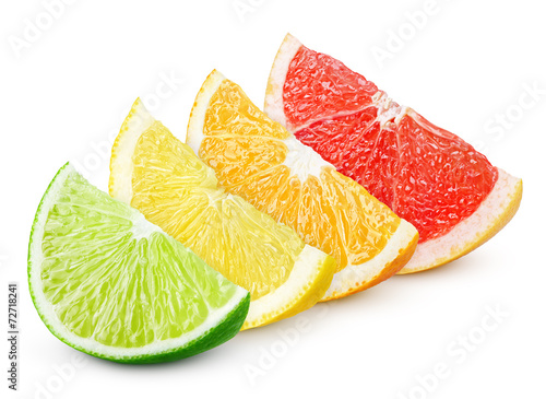 Sliced citrus fruit: lime, lemon, orange and grapefruit on white
