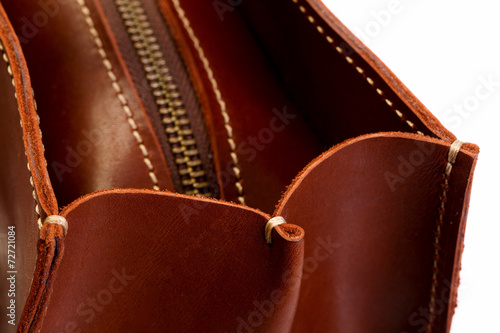 Brown leather boot or bag with zipper photo