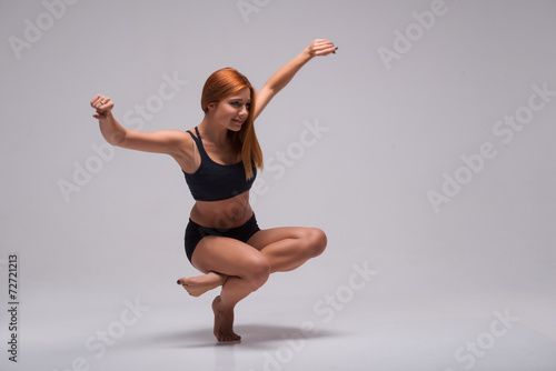 Woman gymnast stretching