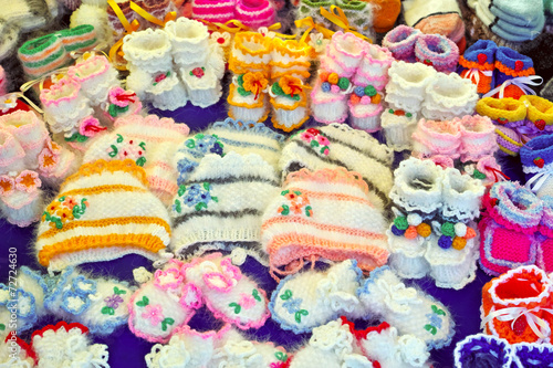 Knitted woolen baby shoes and hats