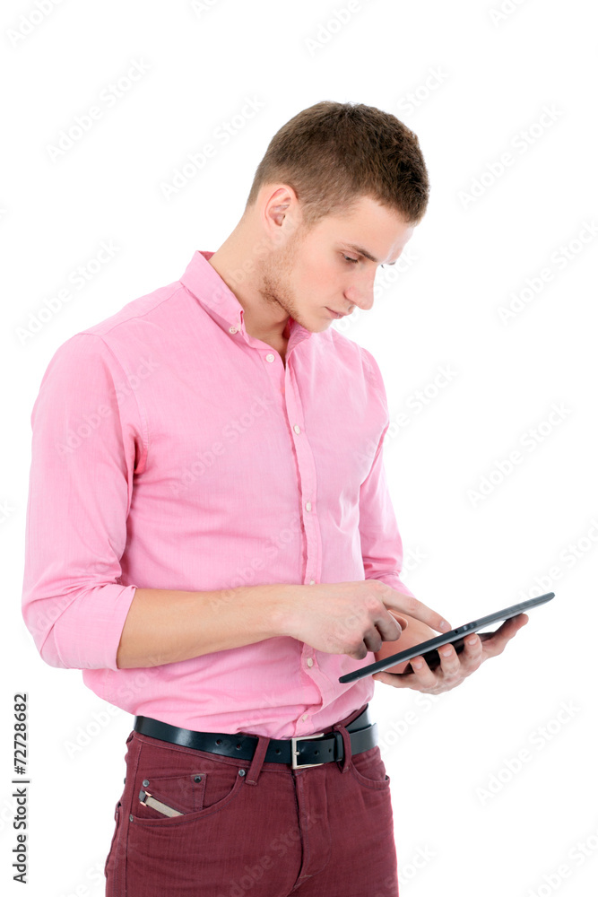 Man touching his tablet pc. Searching for something or reading. Man touching his tablet pc. Searching for something or reading.