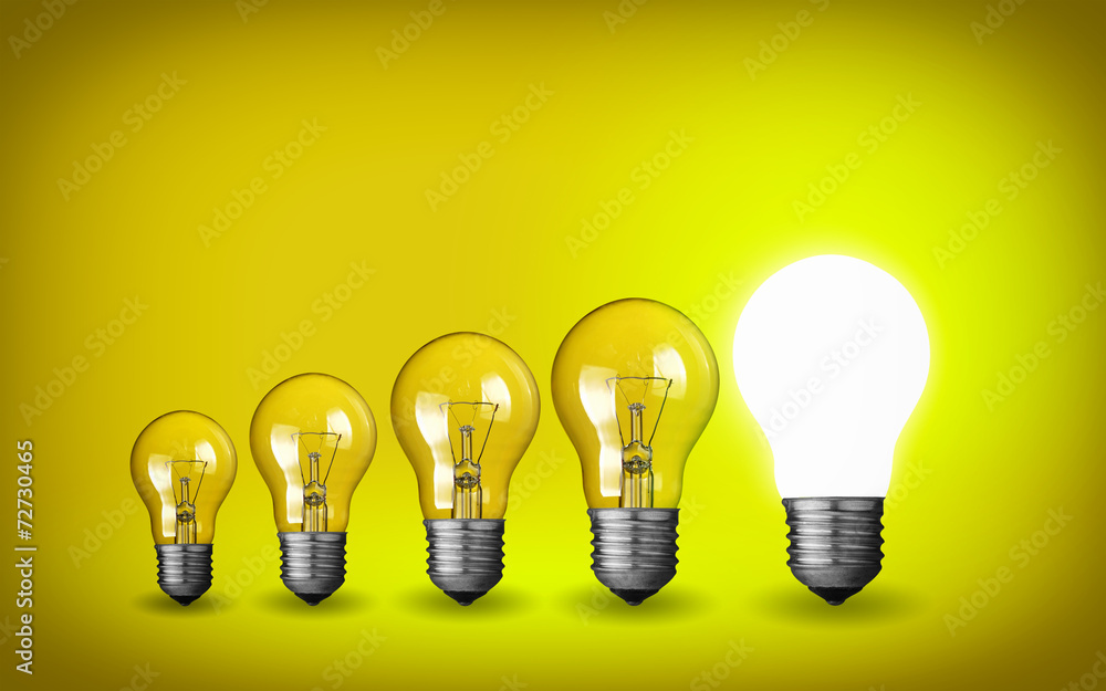 Row of light bulbs.Idea concept on yellow background. Row of light bulbs.Idea concept on yellow background.