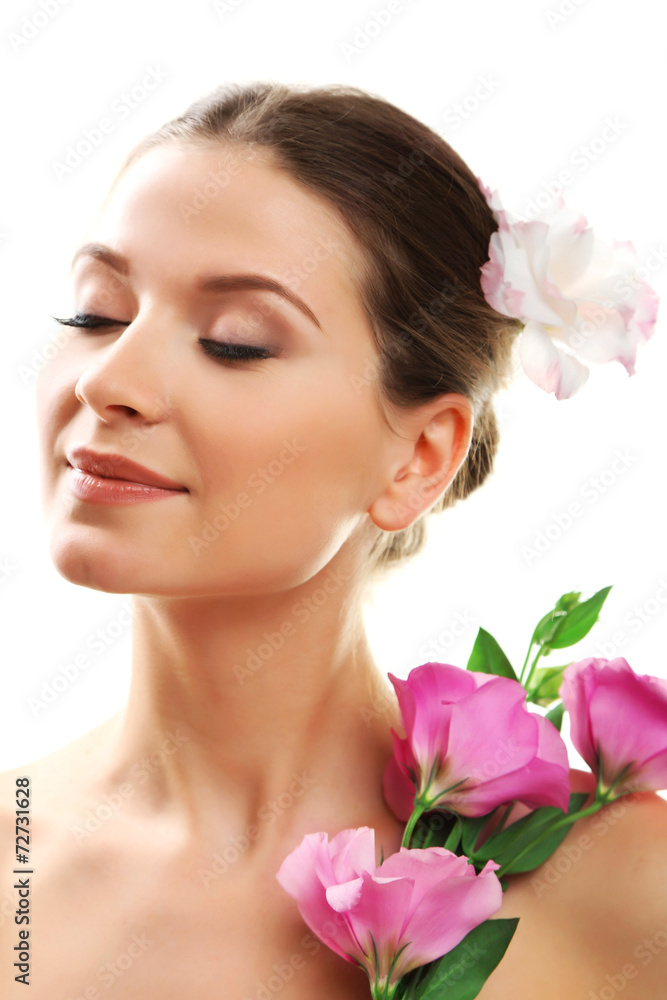 Beautiful young woman with flowers isolated on white Beautiful young woman with flowers isolated on white
