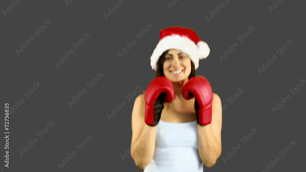 Festive brunette boxing to camera Festive brunette boxing to camera