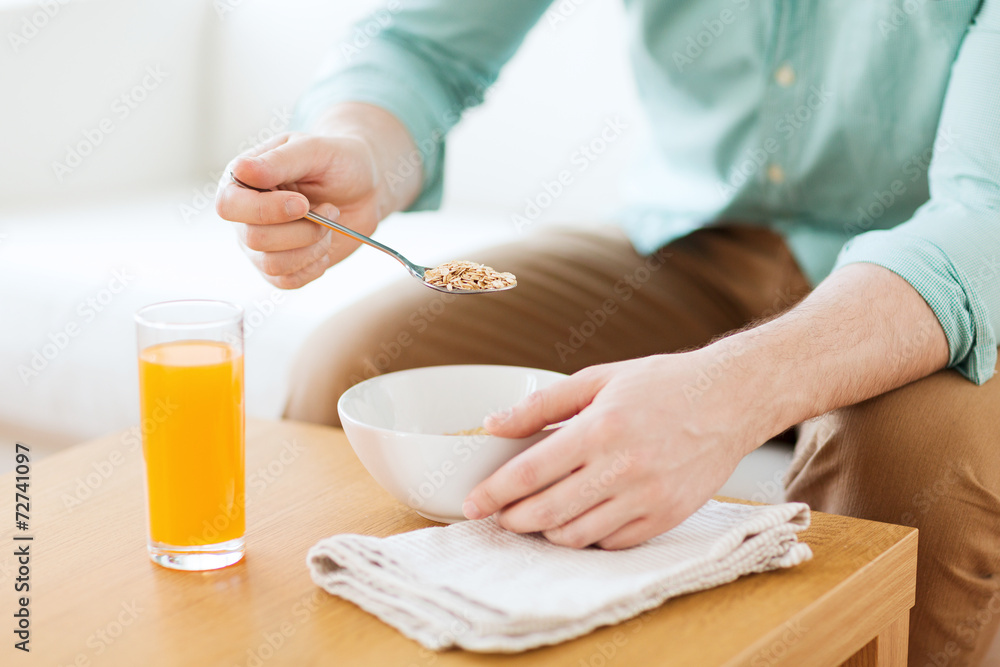 close up of man eating breakfast at home close up of man eating breakfast at home