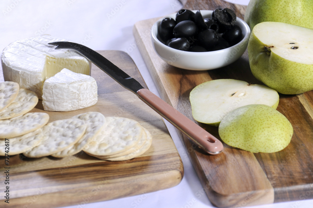 Camembert cheese with pears and olives Camembert cheese with pears and olives