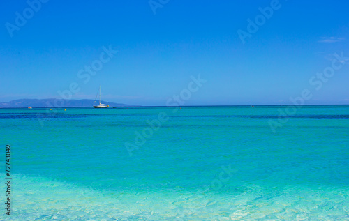 Incredibly clean turquoise water in the sea near tropical island © travnikovstudio
