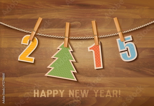 2015 with a christmas tree on wooden background. Vector.