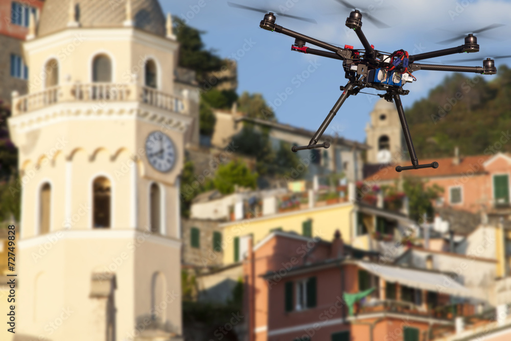 A flying drone  with a blurred background