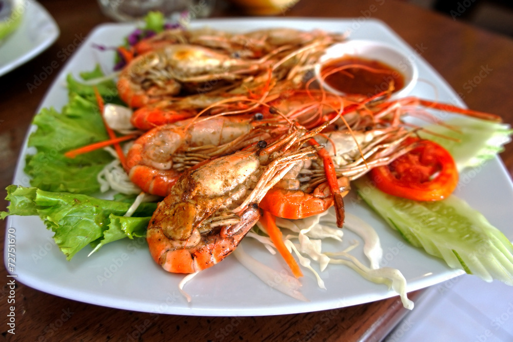 Tiger shrimp prawns with fresh lettuce in plate Tiger shrimp prawns with fresh lettuce in plate