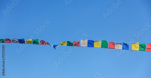 Tibetan prayer flags blowing in the wind