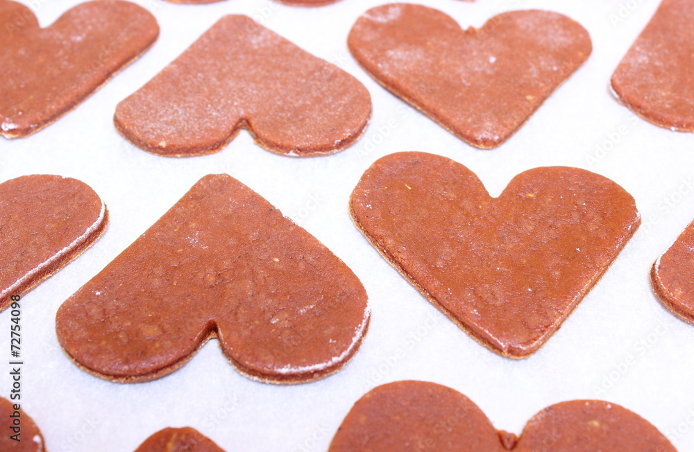 Gingerbread dough for Christmas cookies, shape of heart Gingerbread dough for Christmas cookies, shape of heart