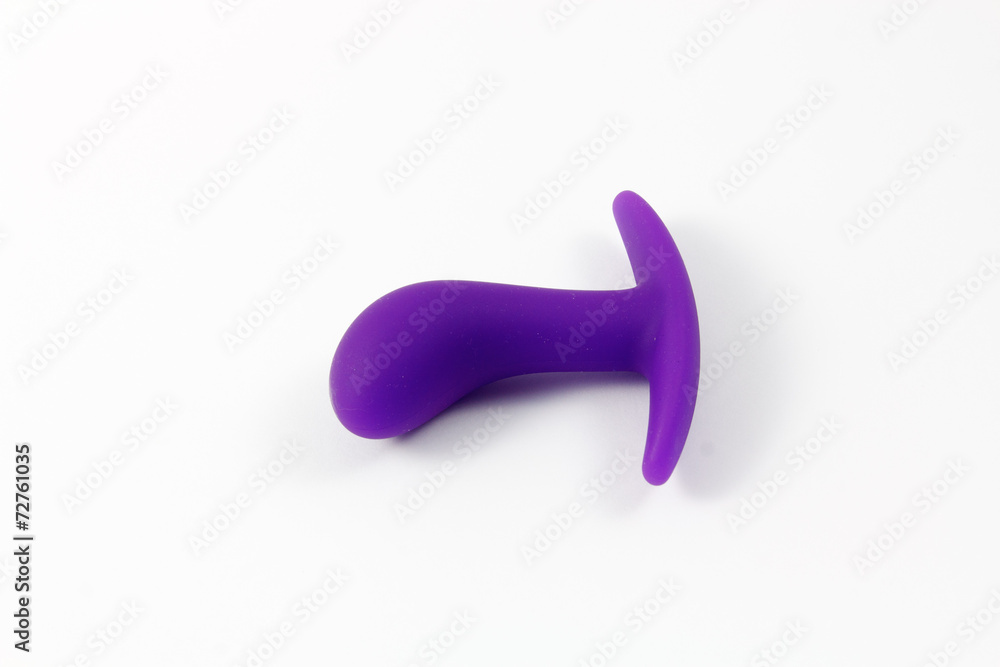 Sex Toy - Lila Anal Plug vor weißem Hintergrund Sex Toy - Lila Anal Plug vor weißem Hintergrund