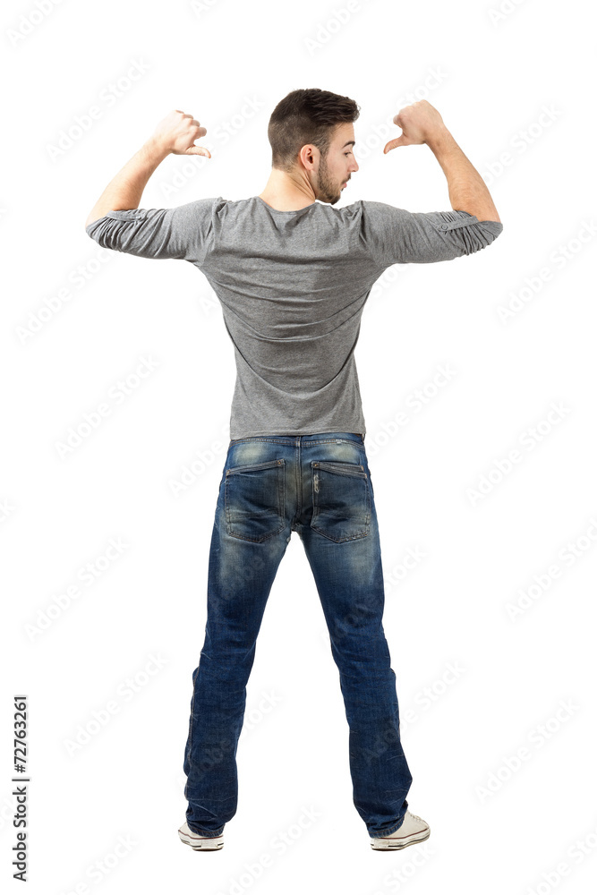 Man pointing something on his back Man pointing something on his back