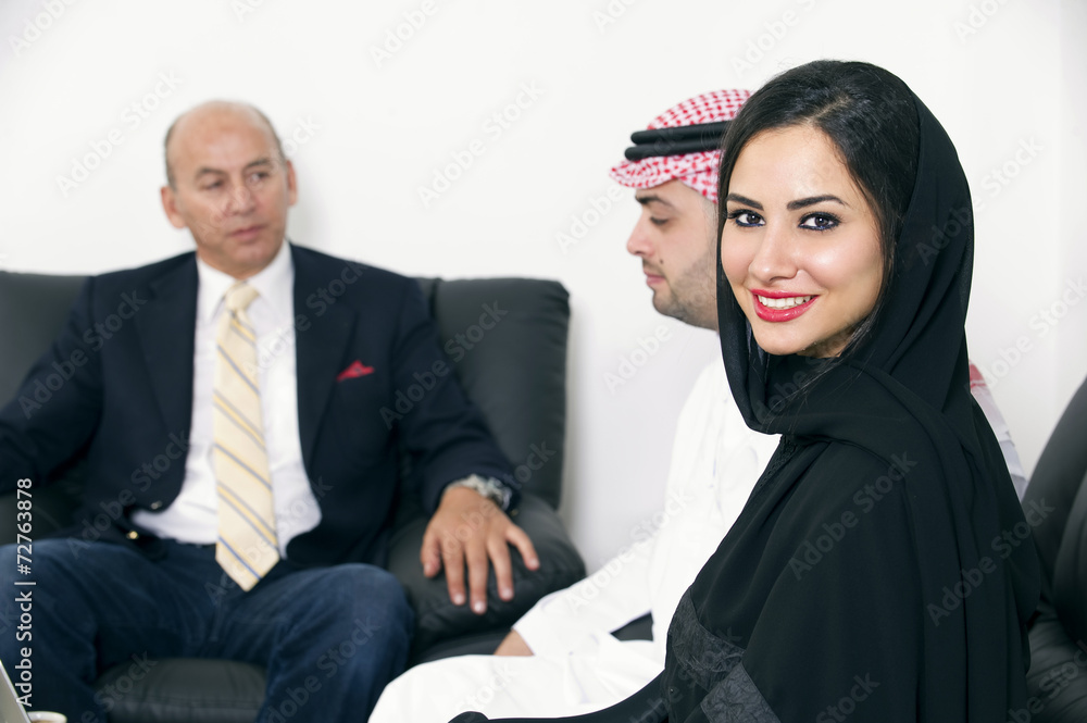 Arabian Businesspeople meeting with foreigner