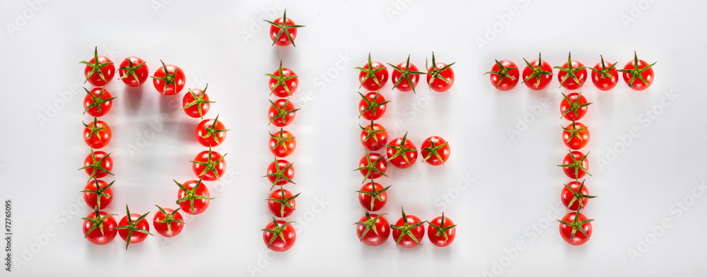 White board with tomatoes cherry on it set out the word DIET White board with tomatoes cherry on it set out the word DIET