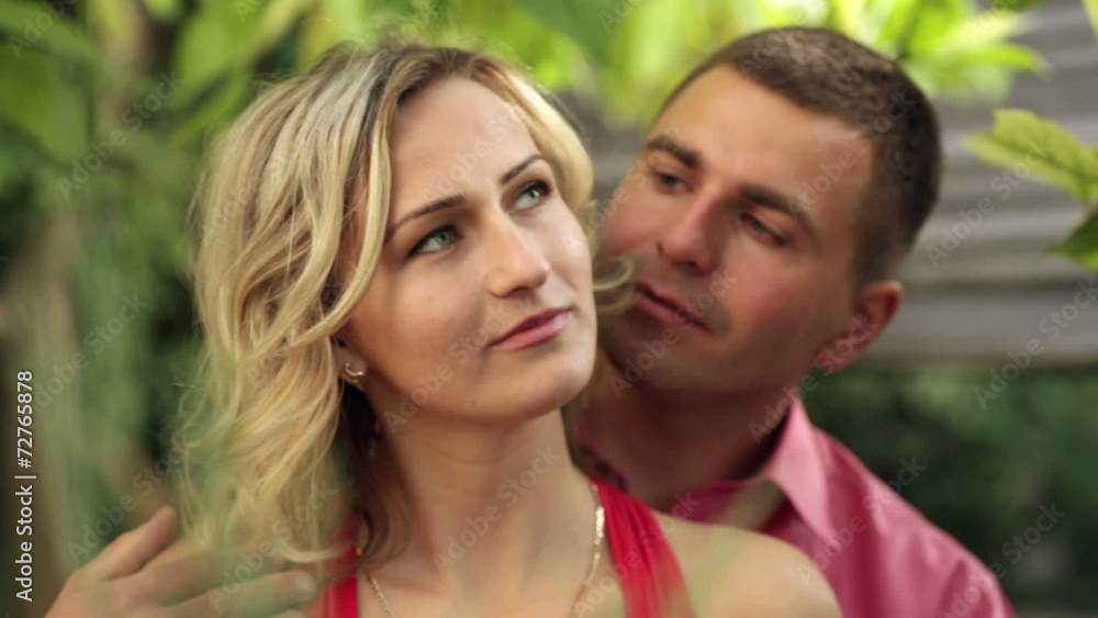 loving couple walking in the summer park loving couple walking in the summer park