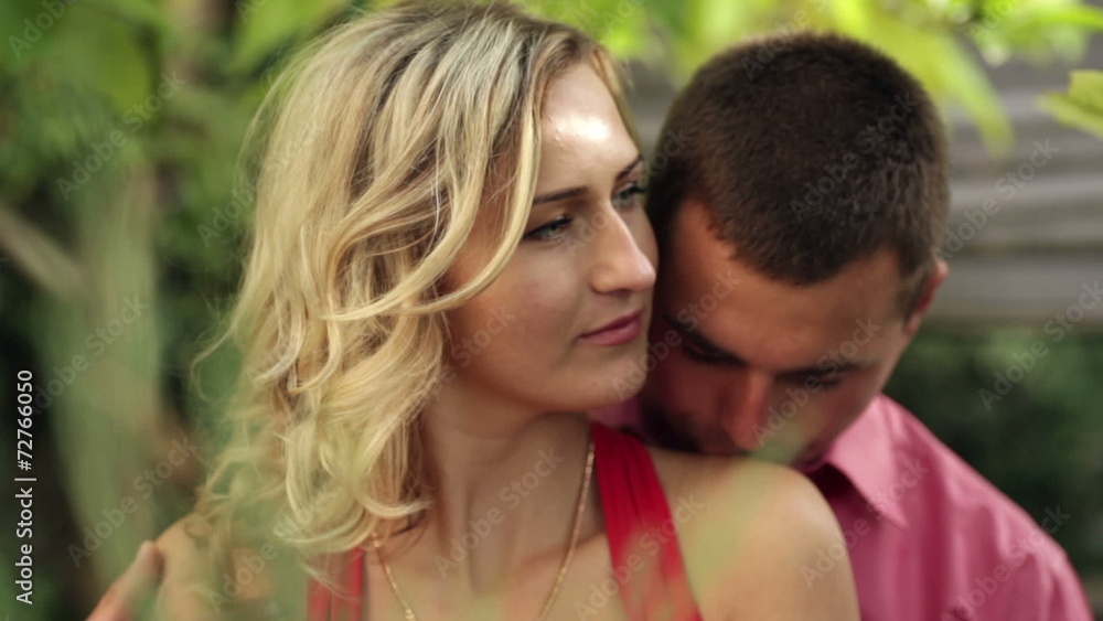 loving couple walking in the summer park loving couple walking in the summer park