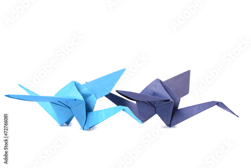 Two origami crane isolated over white background