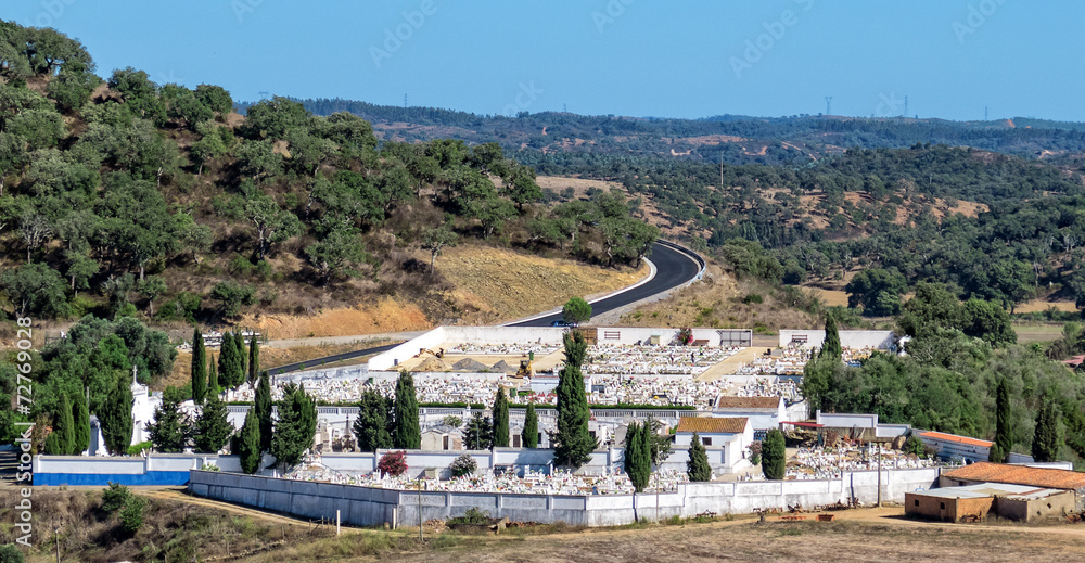 Obraz premium Catholic Cemetery near Small Town