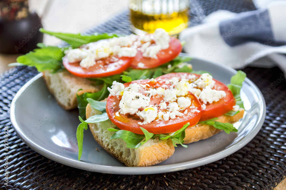 Feta with tomato and rocket sandwich Feta with tomato and rocket sandwich