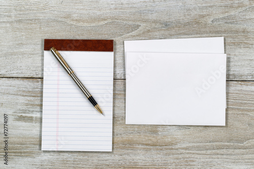 фотографія Letter Writing Materials on Wooden Desktop
