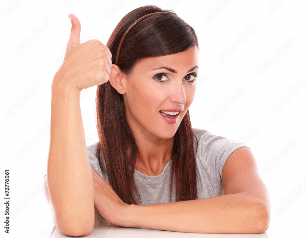 Beautiful female with thumb up smiling Beautiful female with thumb up smiling