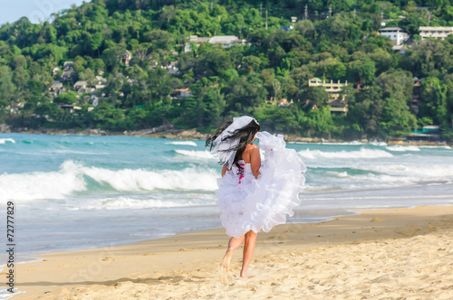 Young bride selebrating honeymoon in Phuket photo