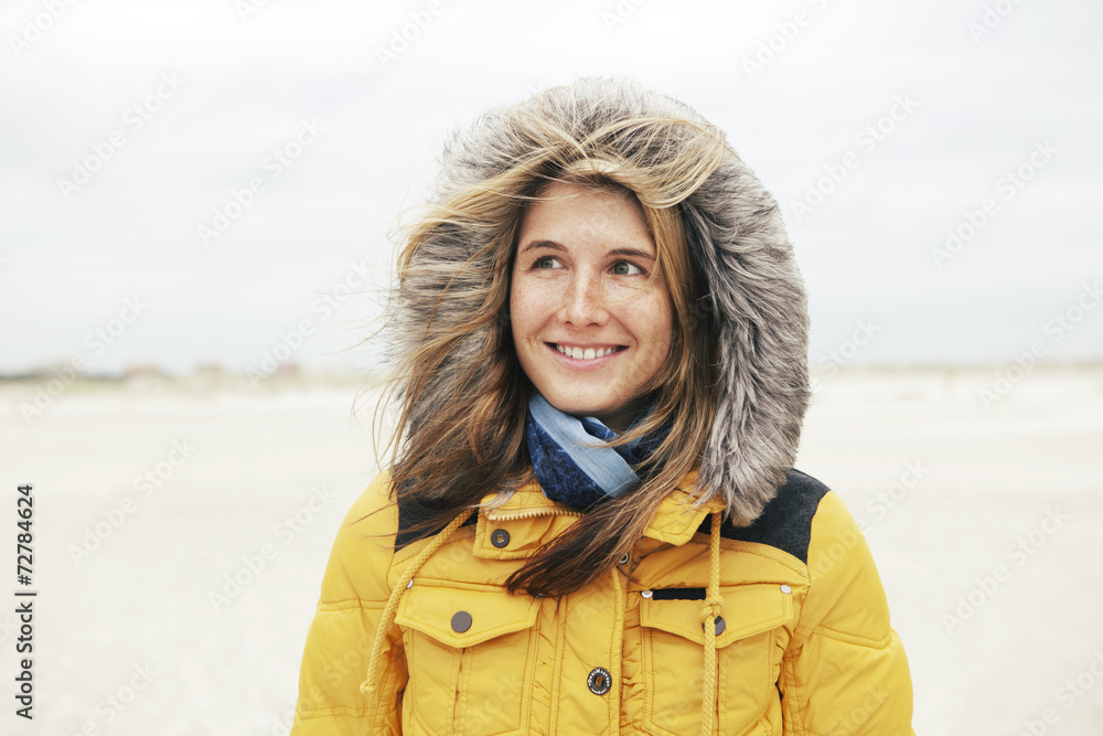 Woman in winter on the beach Woman in winter on the beach