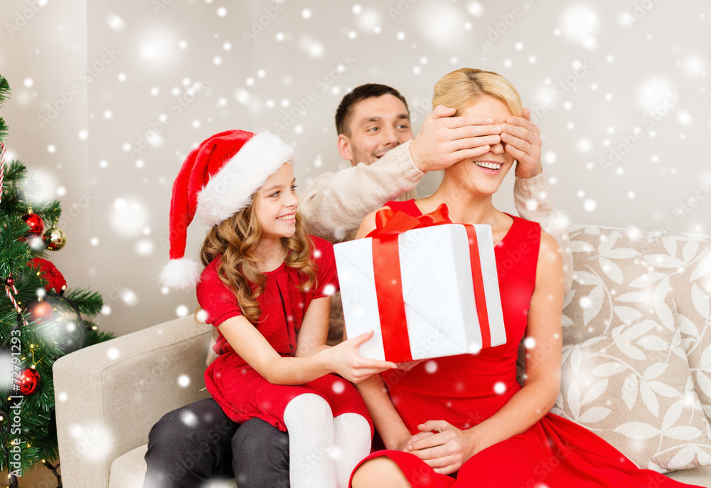 smiling family with gift box smiling family with gift box