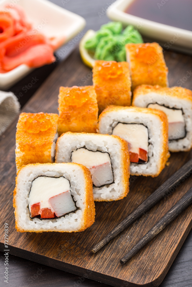 Fried sushi roll with shrimp and caviar Fried sushi roll with shrimp and caviar
