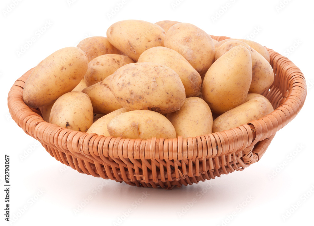 Potato tuber in wicker basket isolated on white background Potato tuber in wicker basket isolated on white background