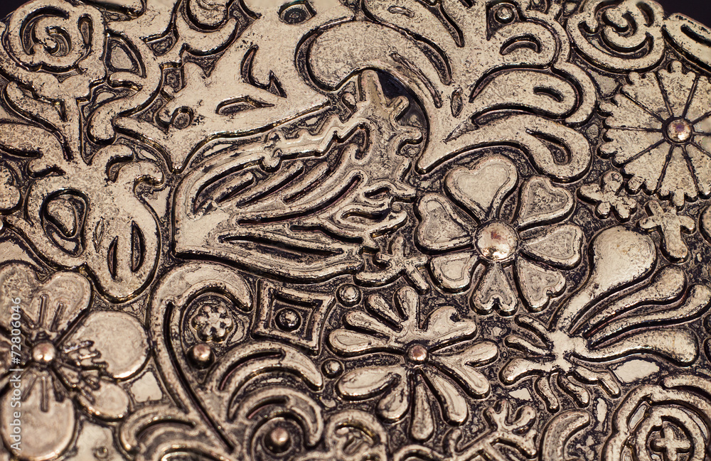 Floral pattern on brass plate