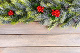 Beautiful Christmas border from fir and mistletoe
