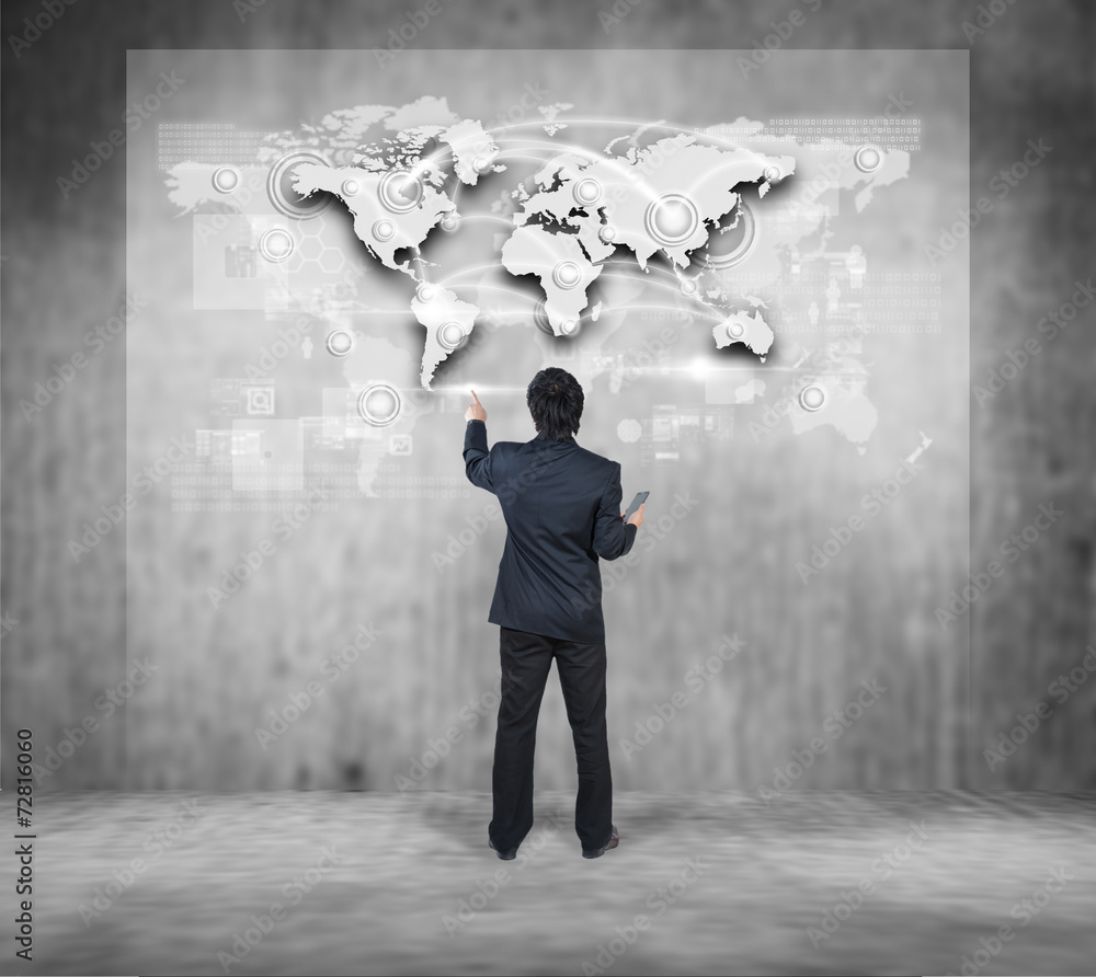 Businessman pressing on digital virtual screen, globalization ma Businessman pressing on digital virtual screen, globalization ma