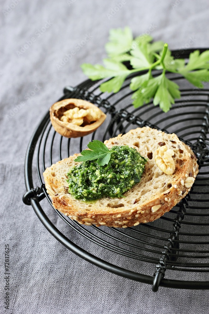 Delicious homemade pesto of green herbs with walnuts Delicious homemade pesto of green herbs with walnuts