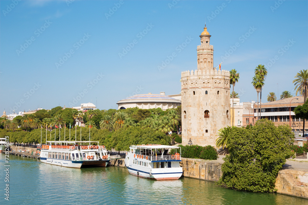 Seville - The medieval tower Torre del Oro on the waterfront