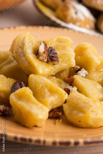 homemade pumpkin gnocchi with pecan nuts