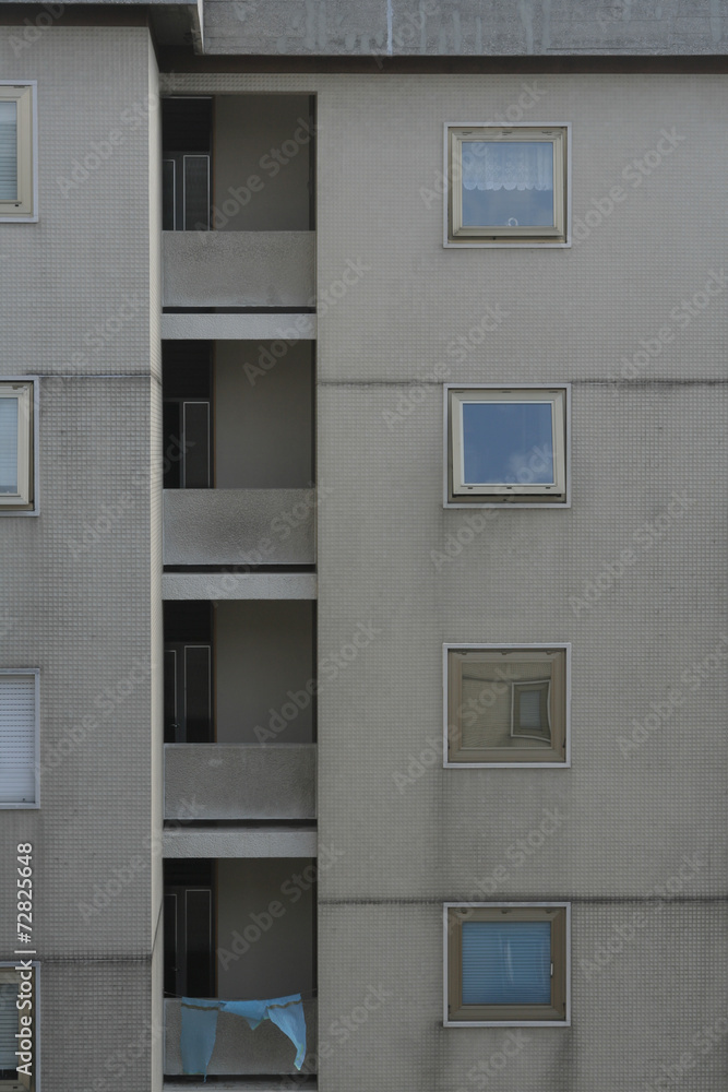 Fototapeta premium windows of an apartment block in trieste, italy