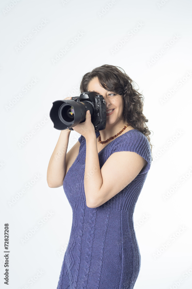 Young woman making a photograph Young woman making a photograph