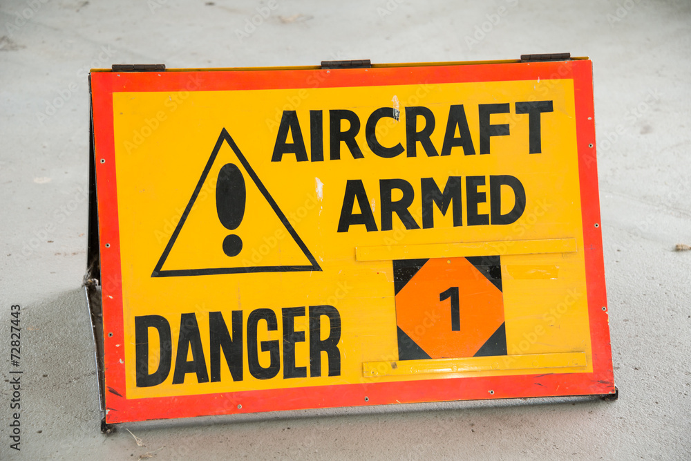 Naklejka premium Aircraft Armed sign
