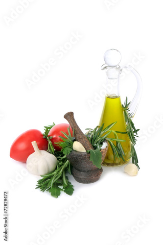 Fototapeta Naklejka Na Ścianę i Meble -  Tomatoes, garlic, olive oil and  herbs for sauce preparation