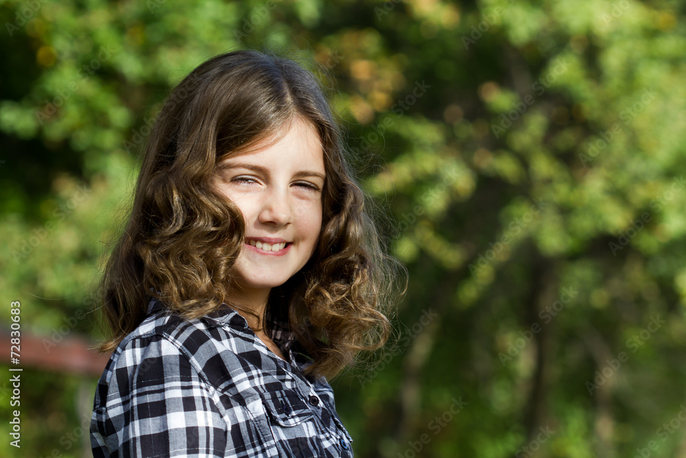 Pretty haired little girl outdoor portrait Pretty haired little girl outdoor portrait